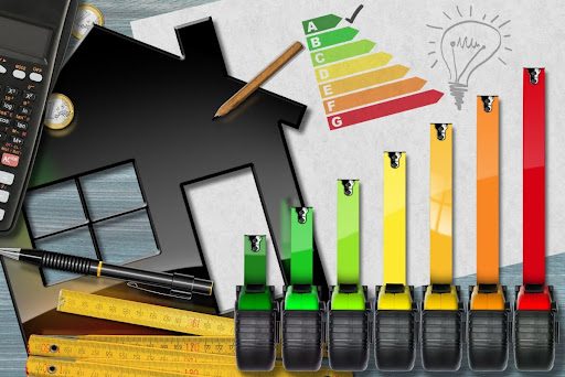 Tape measures in the shape of a energy efficiency rating, a model of house, and a calculator.