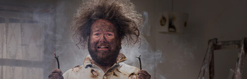 Man with crazy hair who got shocked by an electrical cord