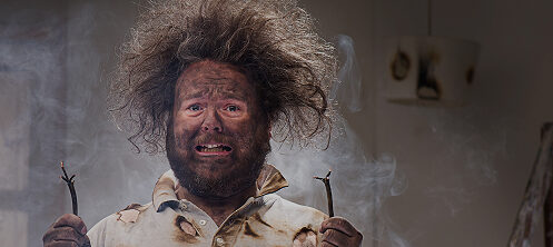 Man with crazy hair who got shocked by an electrical cord