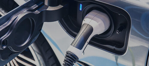 EV charger plugged in to a car